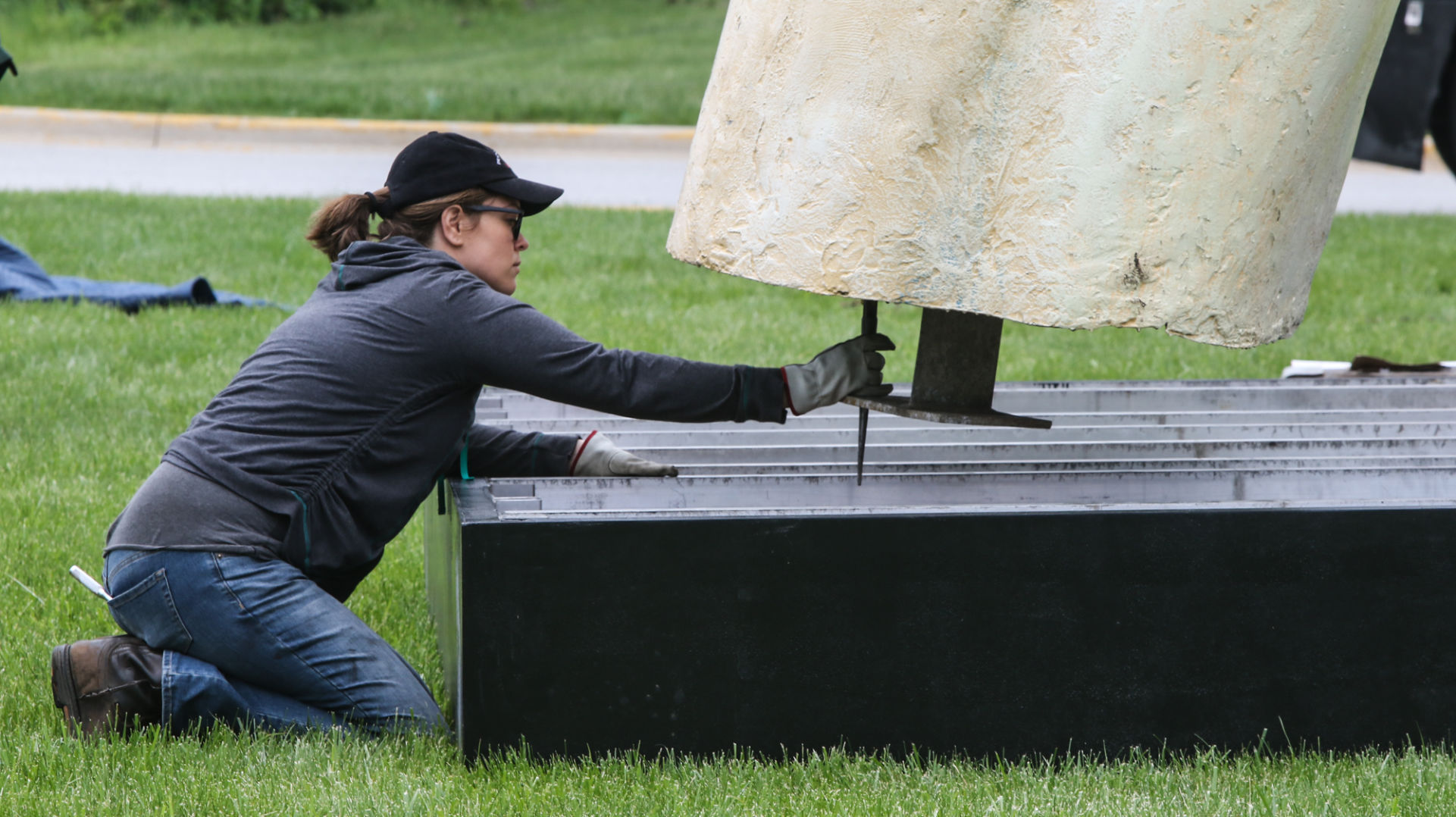 Artist Seward Johnson's "The Tooth" is implanted at the Crown Point Sportsplex